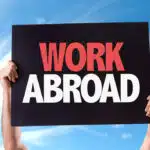 Work Abroad card with sky background